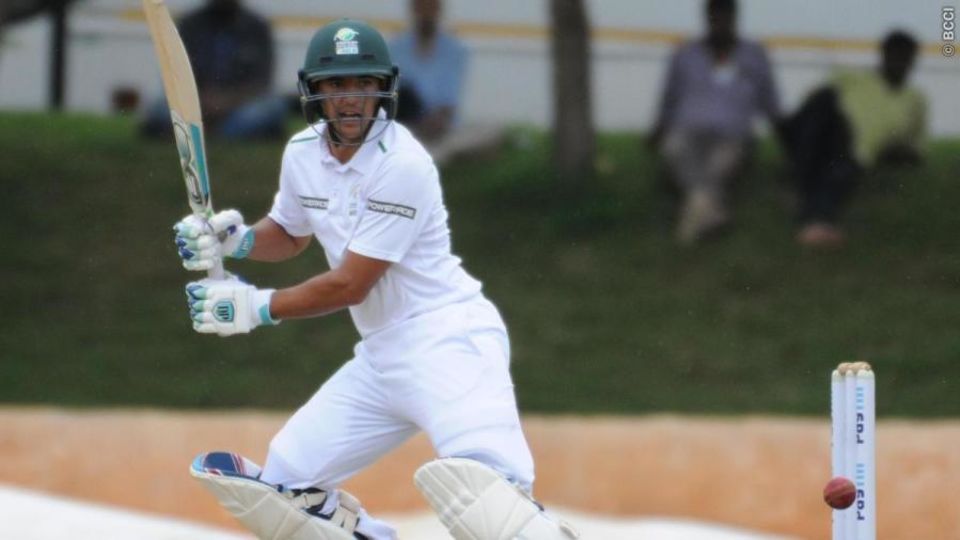 Zubayr Hamza cuts the ball