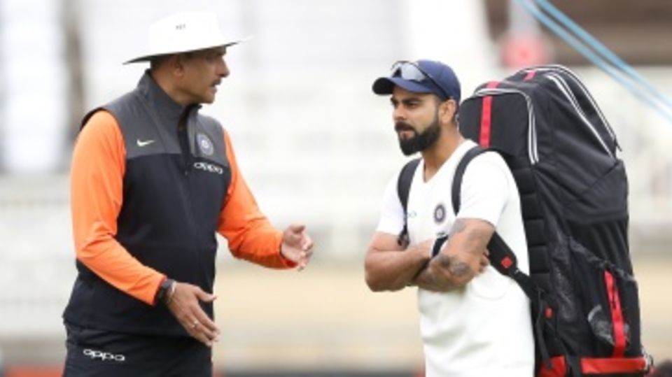 Ravi Shastri and Virat Kohli in discussion during a nets session