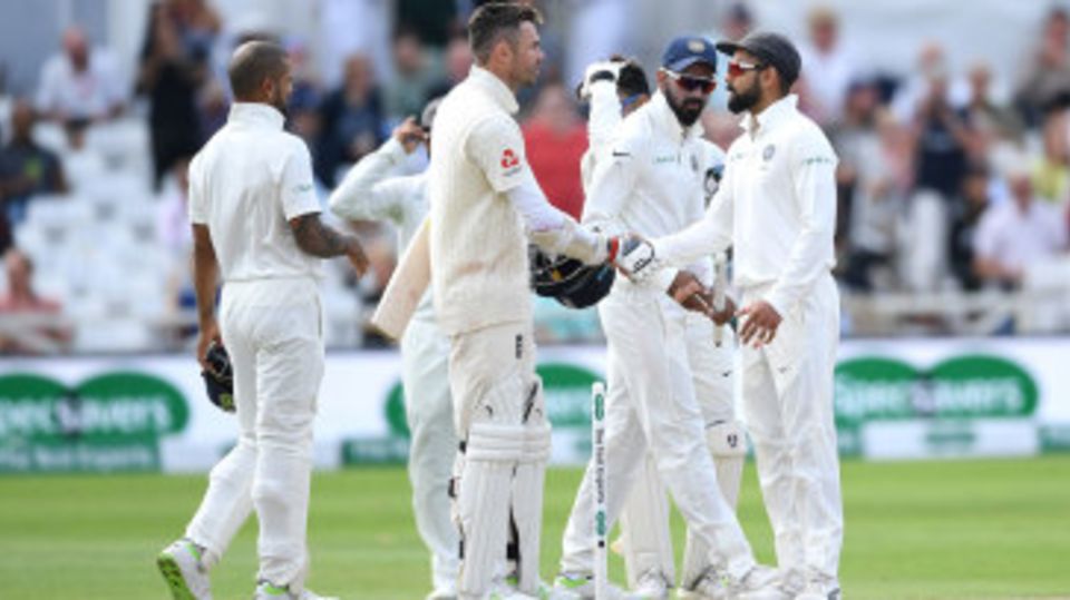 James Anderson shakes hands with Virat Kohli after the match