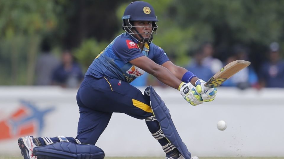Chamari Atapattu stretches for a sweep
