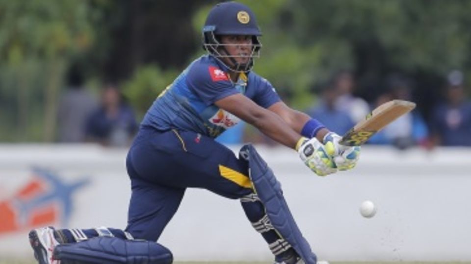 Chamari Atapattu stretches out for a sweep