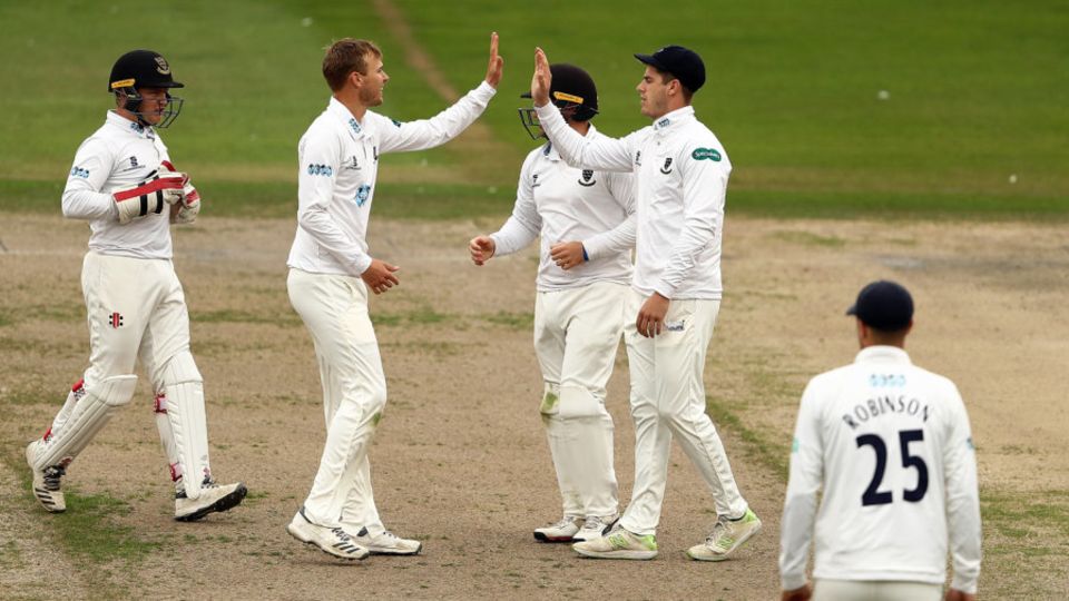 Danny Briggs celebrates a wicket