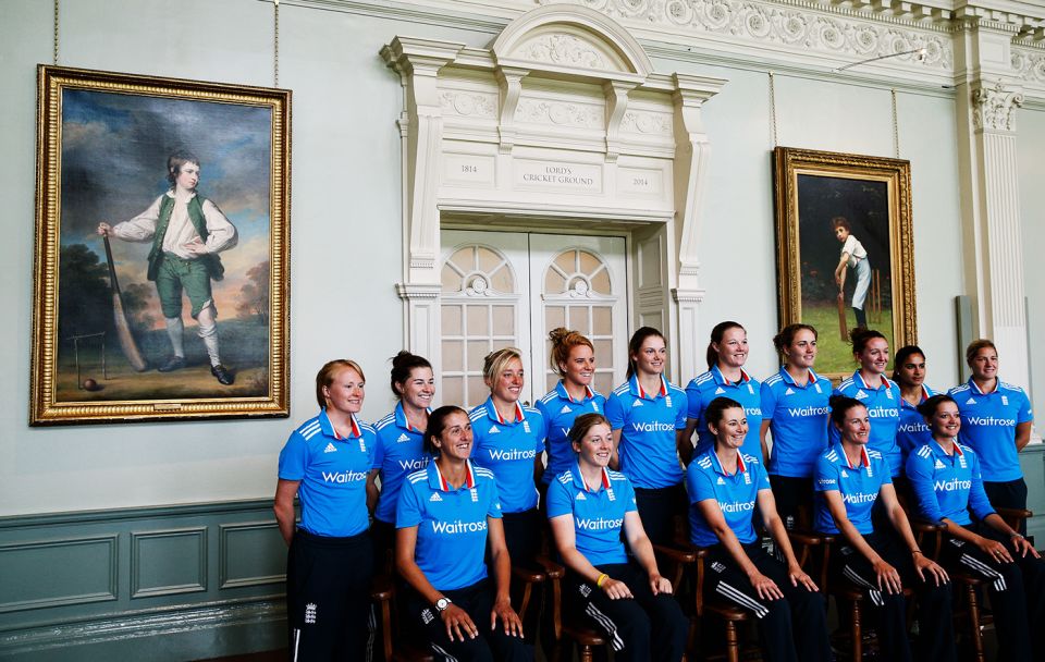 The England team pose for photographs in the Long Room in 2014