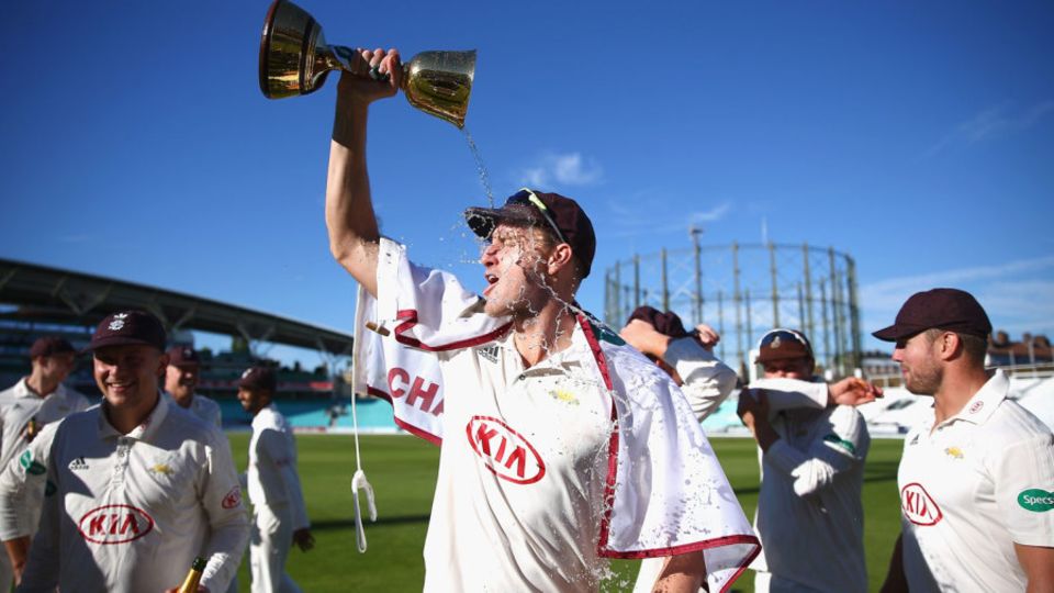Tastes sweet: Morne Morkel drinks in Surrey's title
