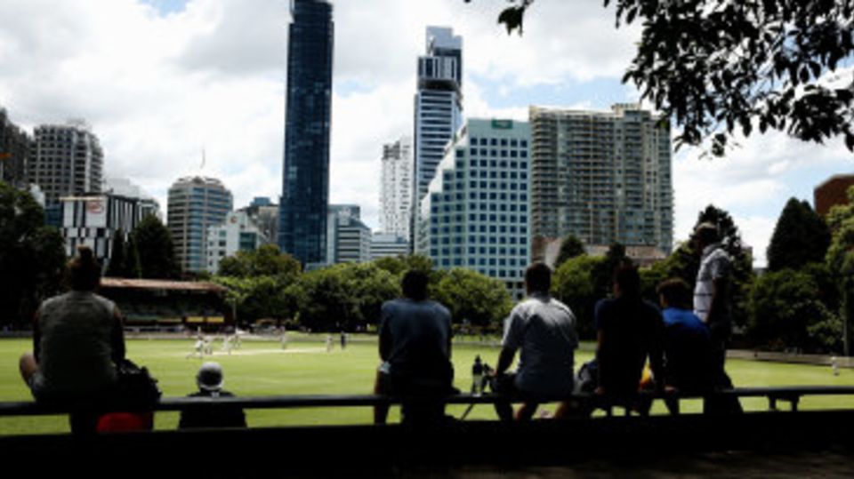 Spectators watch Michael Clarke bat in the Sydney Grade game between Western Suburbs and Gordon at Chatswood Oval