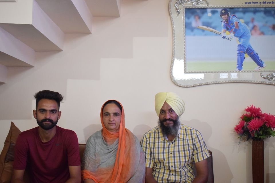 Harry's people: from left, brother Gary, mother Satwinder and father Harmandar
