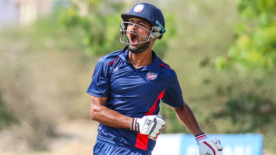 Monank Patel lets out a roar after bringing up his century