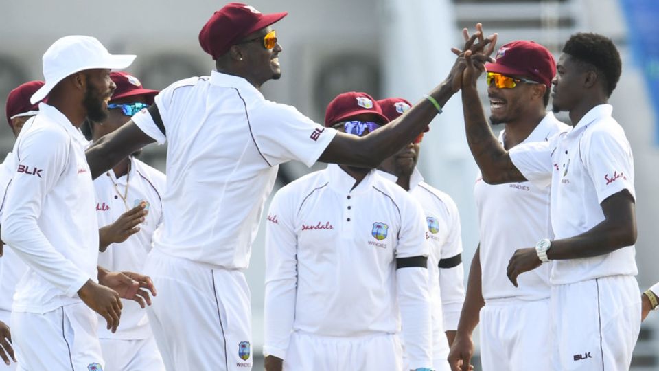 Alzarri Joseph gets a high five from his captain