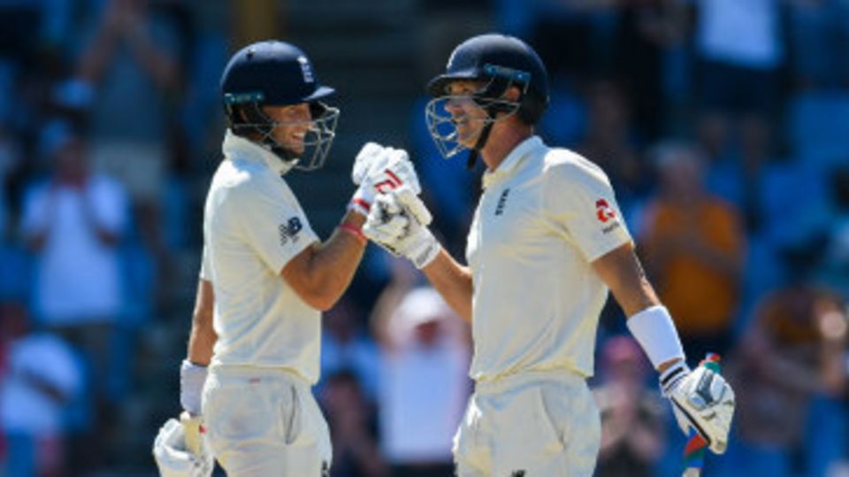 Joe Root congratulates Joe Denly on his maiden fifty