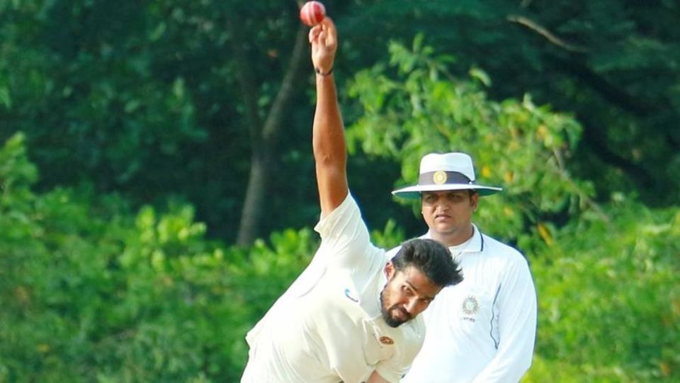 Sandeep Warrier bowls