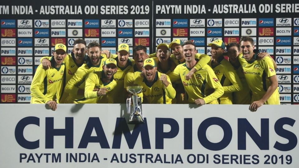 The victorious Australian team poses with the trophy after winning the series