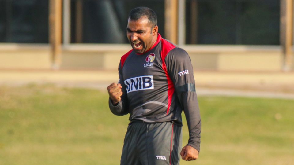 Sultan Ahmed pumps his fist after taking a big wicket