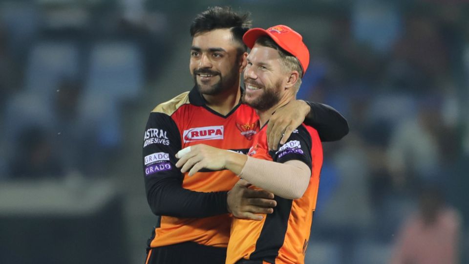 Rashid Khan and David Warner share a light moment