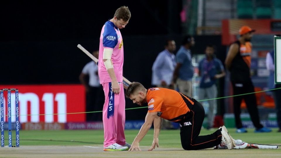 David Warner checks out the pitch while Steven Smith looks on