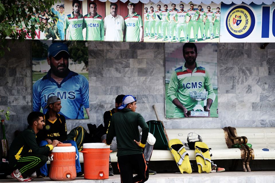 In Peshawar, in Pakistan's north-west, Afghan cricketers (like Mohammad Shahzad, on the poster at left) are as popular and in demand in clubs as local ones are