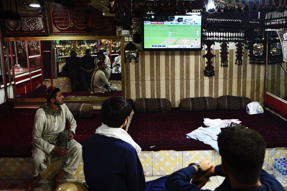 Customers in a restaurant in Kabul watch the India-Afghanistan Test in June 2018