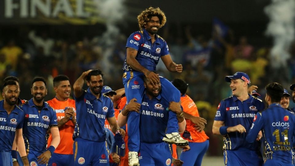 Kieron Pollard lifts Lasith Malinga on his shoulders after victory