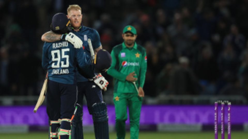 Job done: Ben Stokes and Adil Rashid celebrate victory