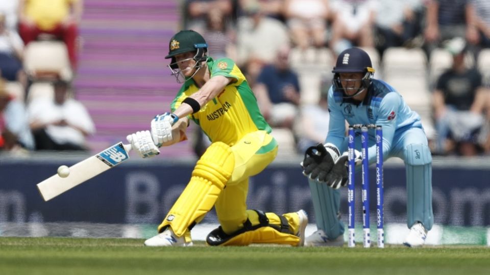 Steven Smith prepares to slog with Jonny Bairstow looking on