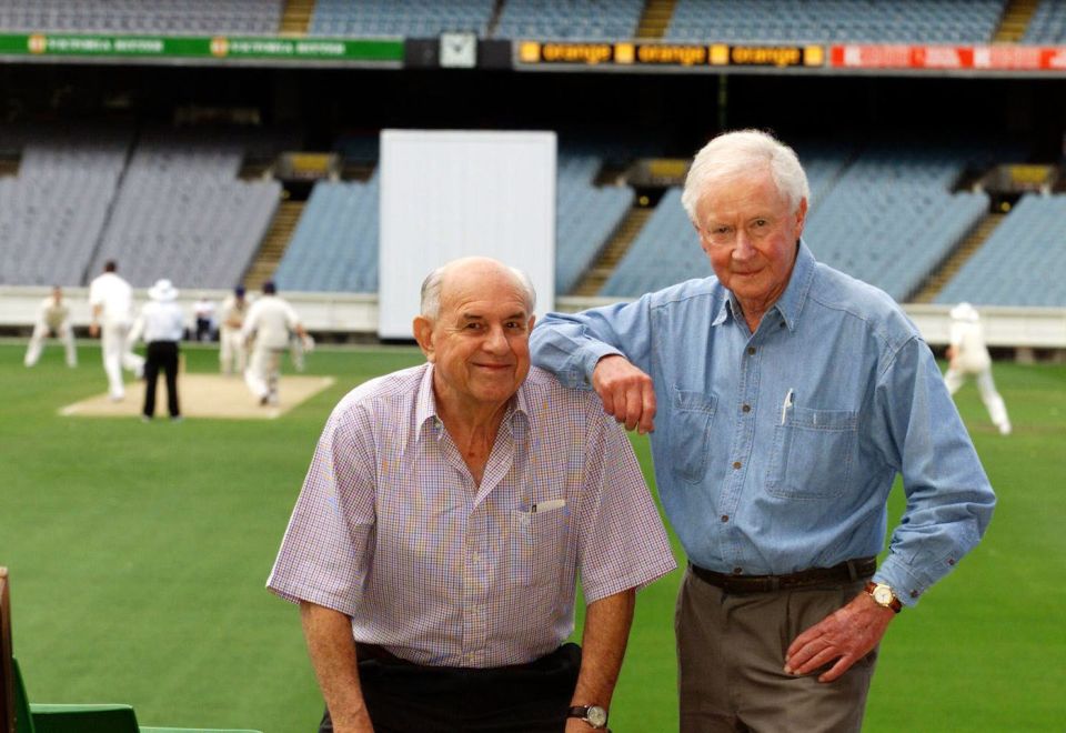 George Thoms, right, with former team-mate Colin McDonald in 2002