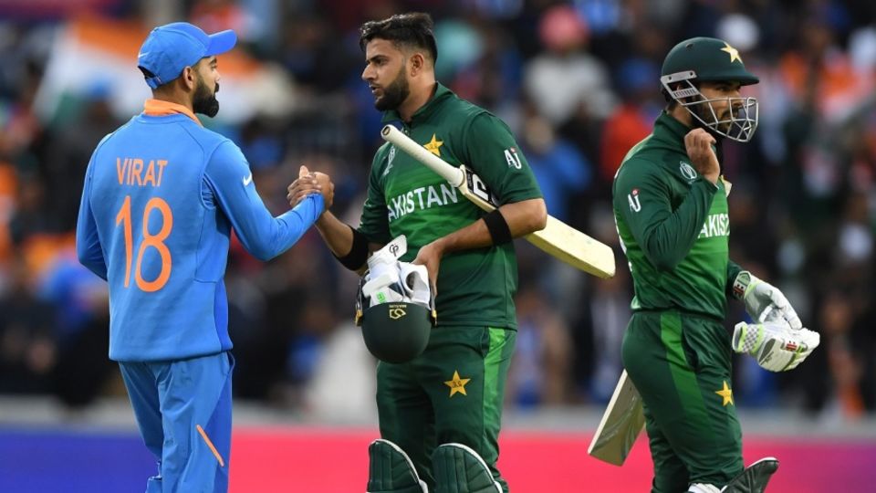 Virat Kohli shakes hands with Imad Wasim after the win