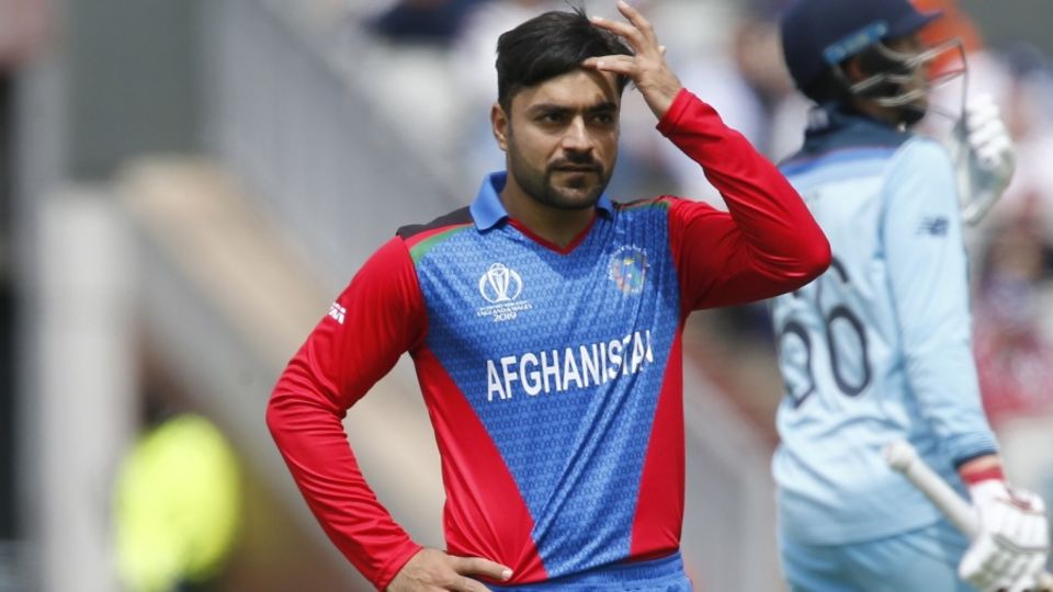 Rashid Khan looks on