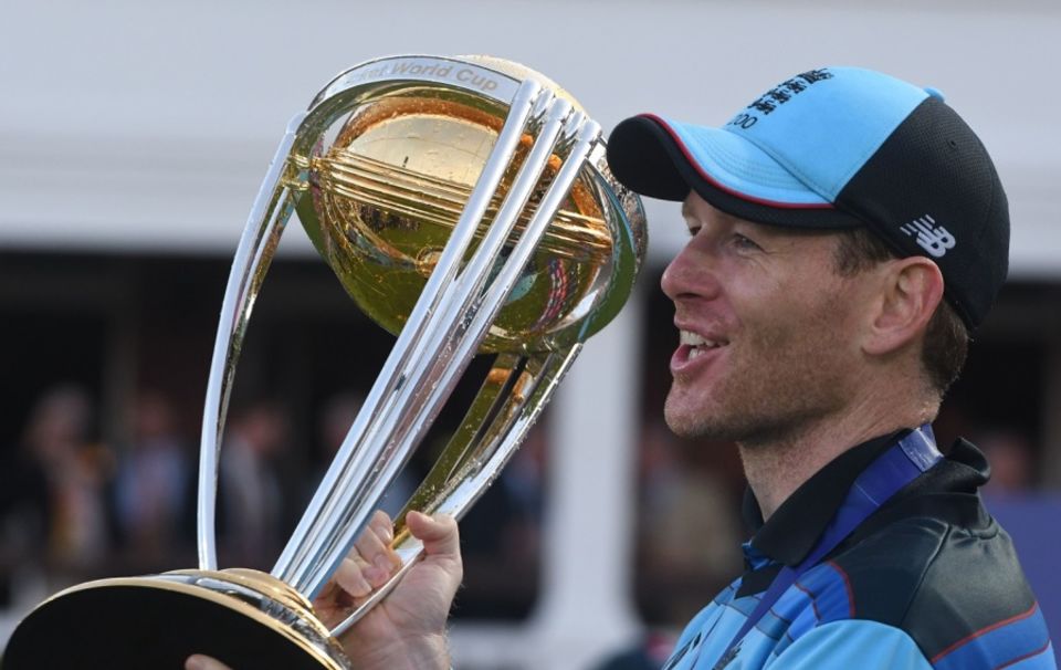 Eoin Morgan poses with the World Cup trophy