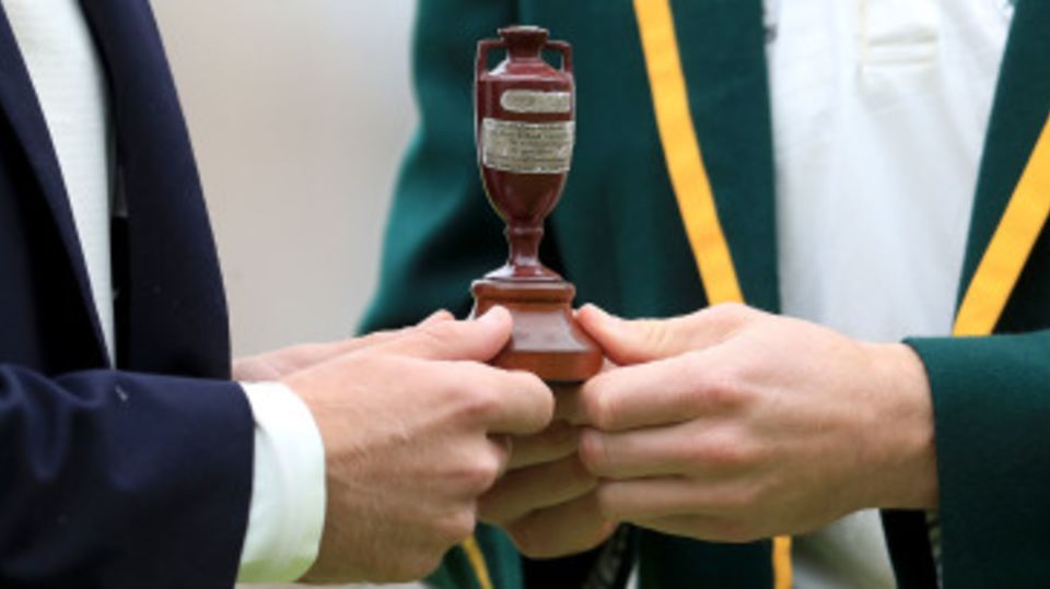 The captains hold the Ashes urn