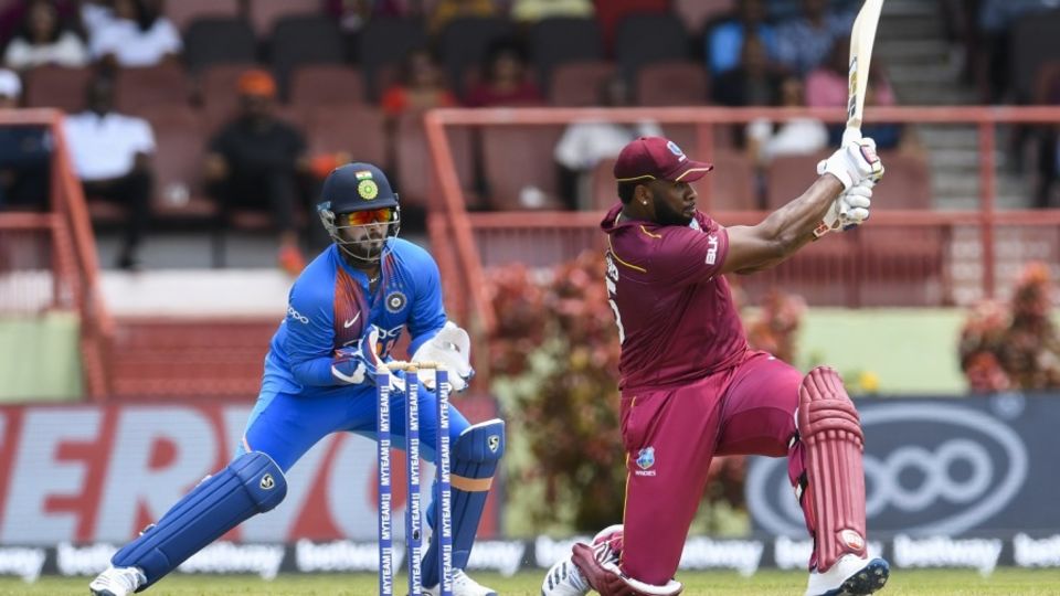 Kieron Pollard muscles a slog-sweep