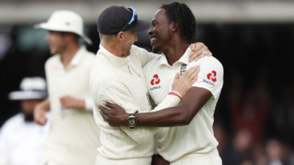 Joe Root gives Jofra Archer a hug