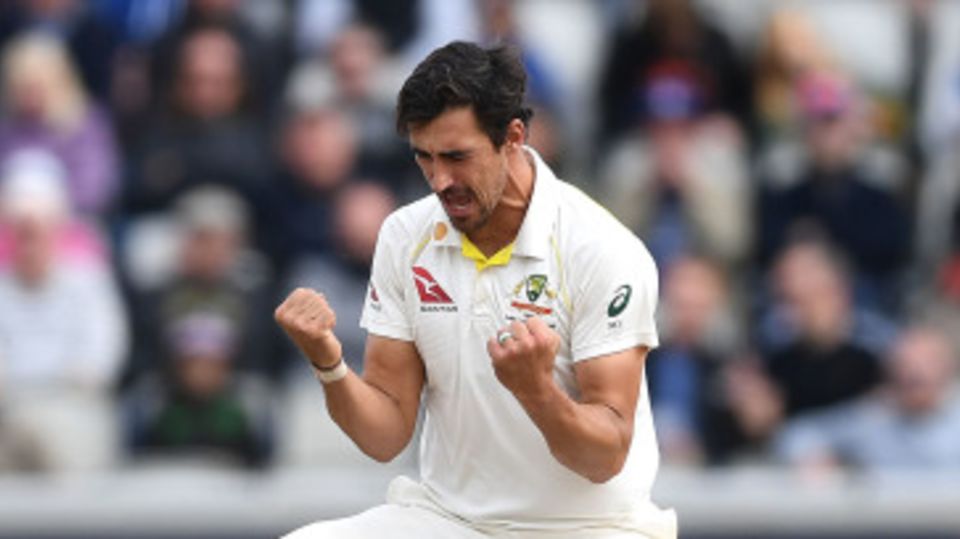 Mitchell Starc celebrates dismissing Jonny Bairstow