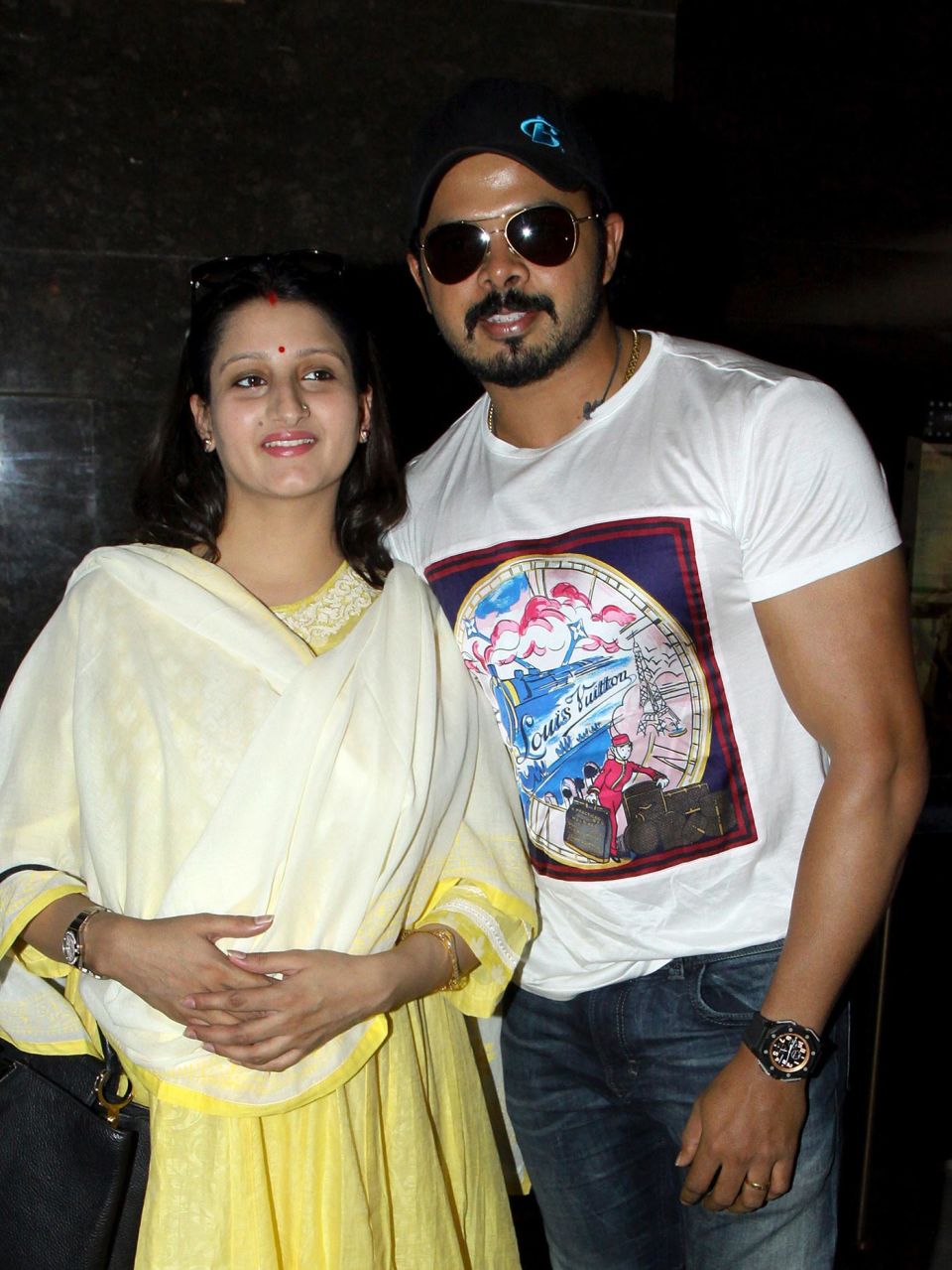 Sreesanth with his wife, Bhuvneshwari Kumari, at a film screening in 2015. Note bulging biceps