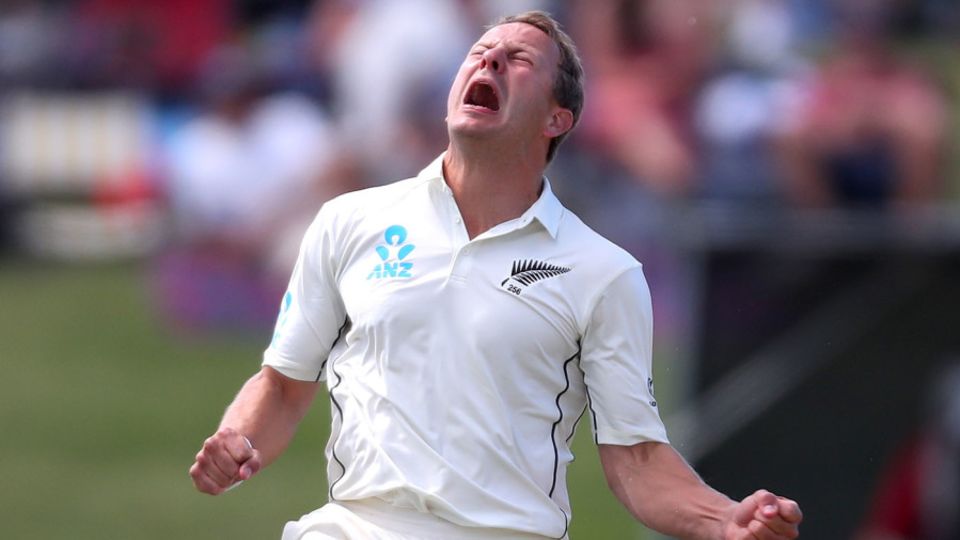 Neil Wagner roars in celebration after dismissing Joe Root