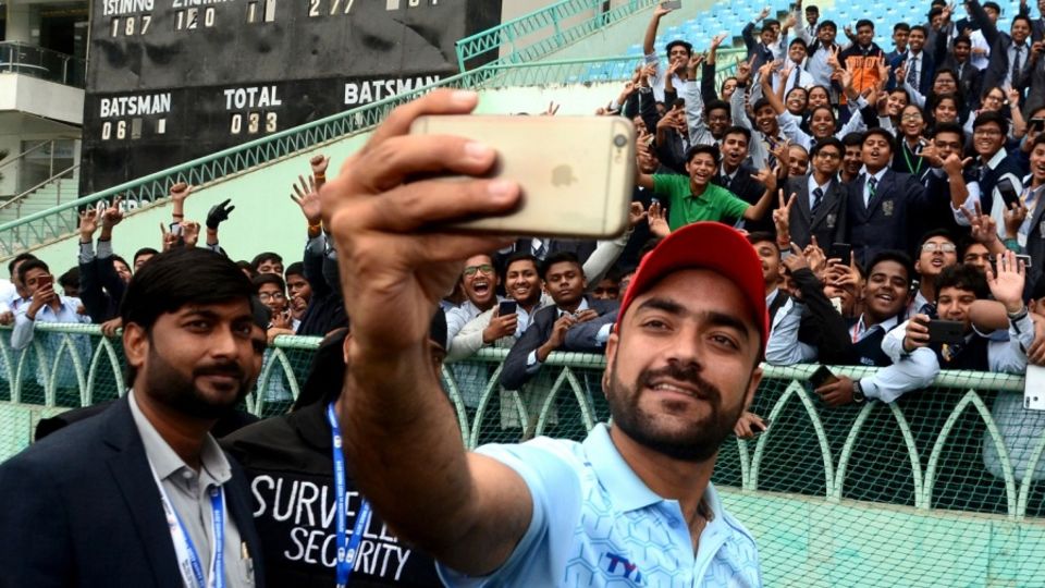 Rashid Khan takes a selfie with the fans