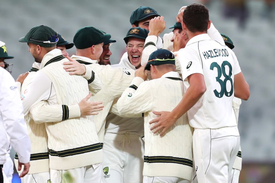 Australia celebrate taking the final wicket