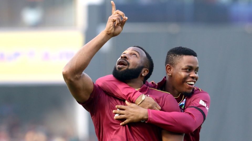 Kieron Pollard and Shimron Hetmyer celebrate Virat Kohli's dismissal