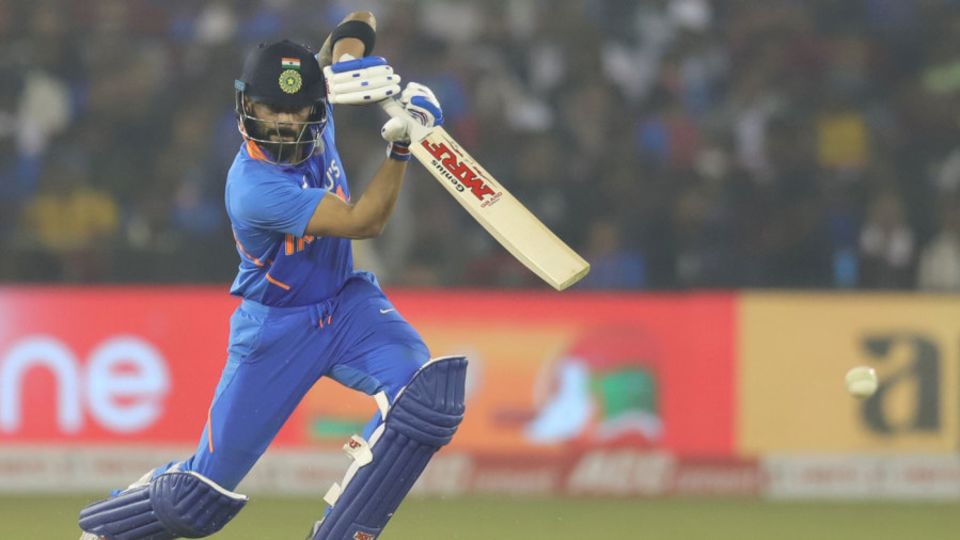 Virat Kohli drives through the off side