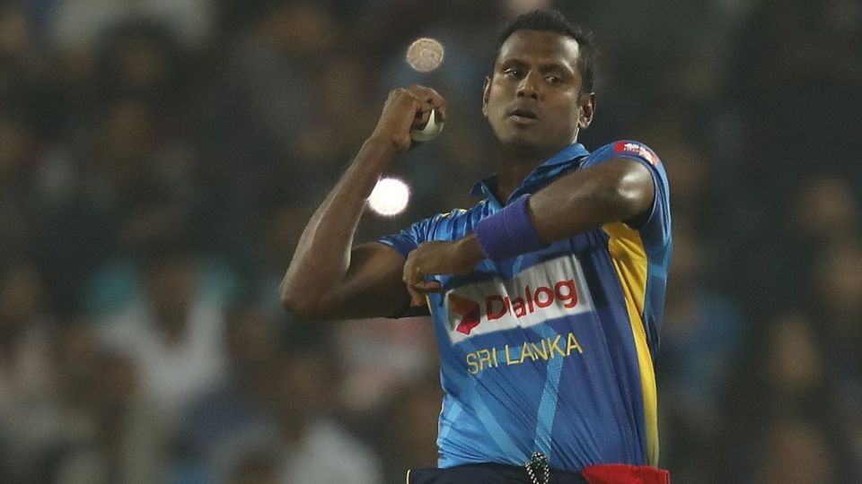 Angelo Mathews looks to roll his fingers over the ball