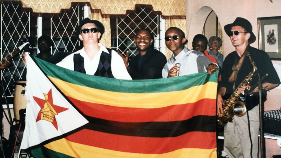 Paul Brickhill and the Luck St Blues band celebrate Zimbabwe's famous series win over England