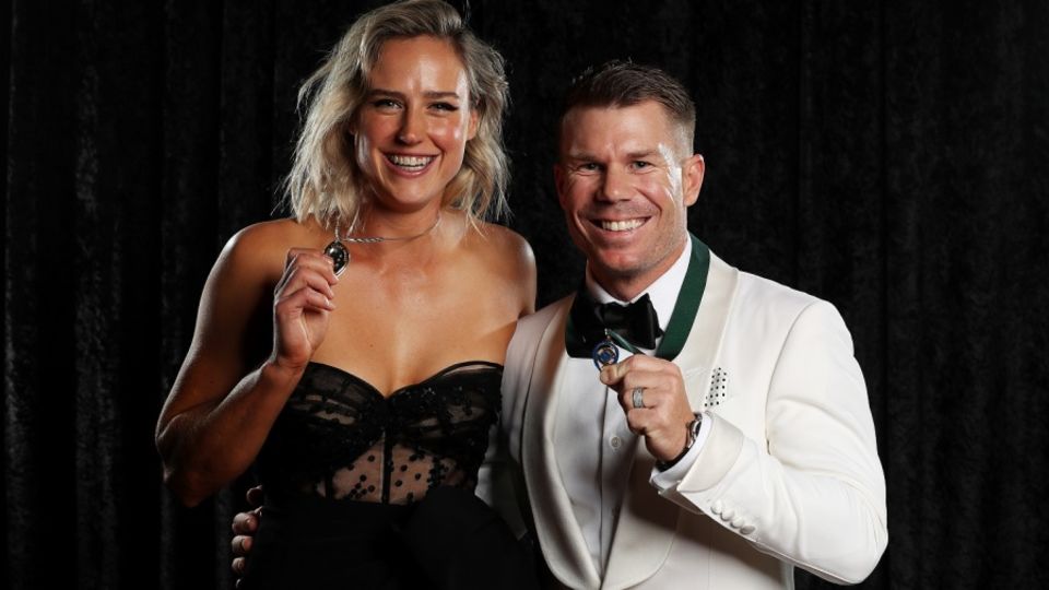 Ellyse Perry, winner of the Belinda Clark medal poses with David Warner, winner of the Allan Border medal