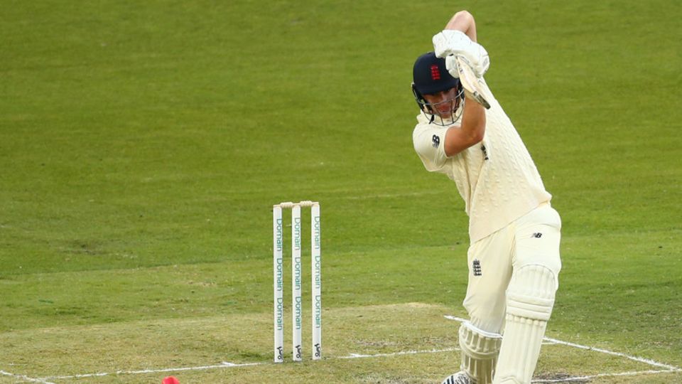 Dan Lawrence drives during his hundred