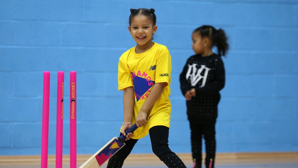 A young girl participates in the ECB's new Dynamos Cricket programme