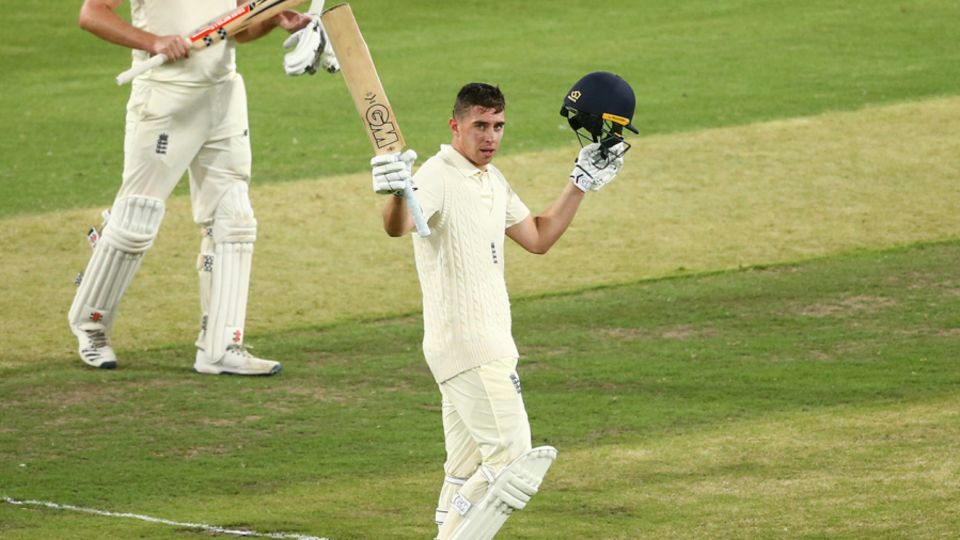 Dan Lawrence celebrates his hundred for England Lions at the MCG