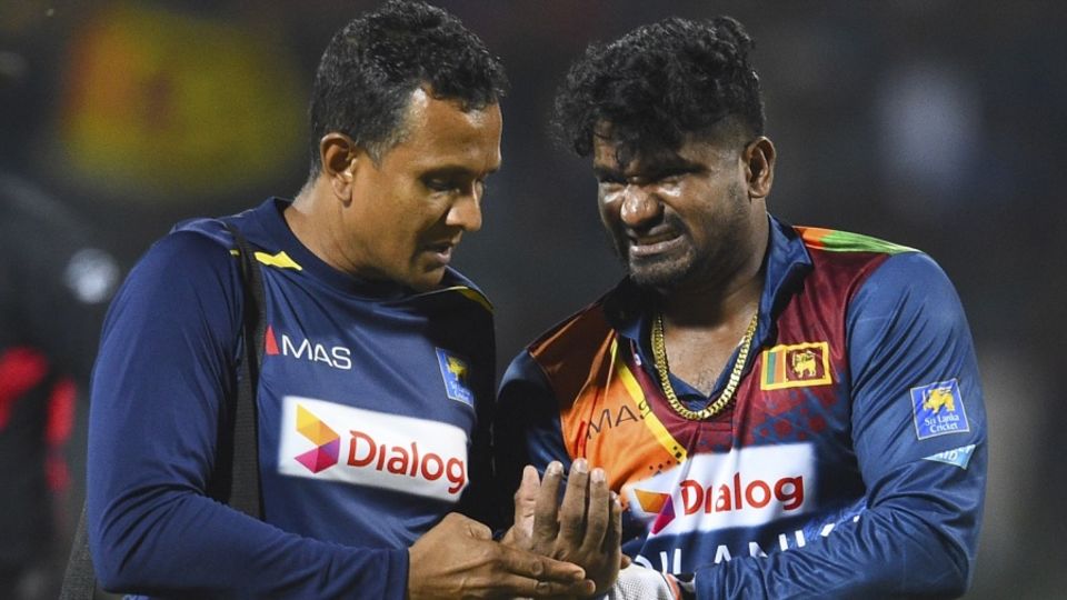 Kusal Perera had to go off the field after hurting a finger