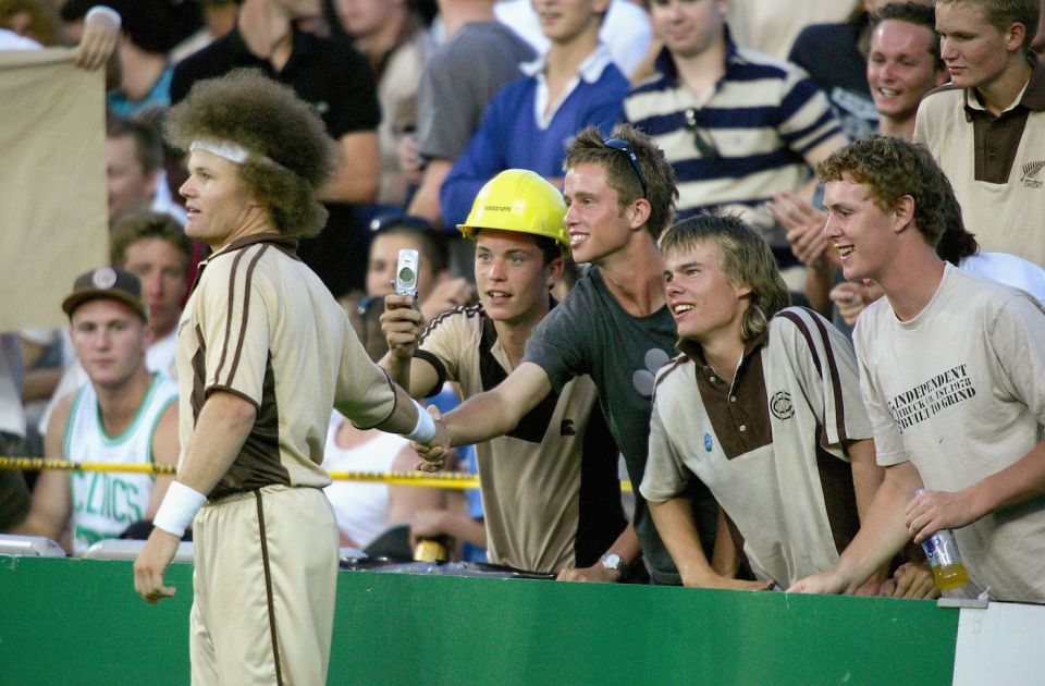 A fan gets a handshake from a resplendent Hamish Marshall having a particularly good hair day.