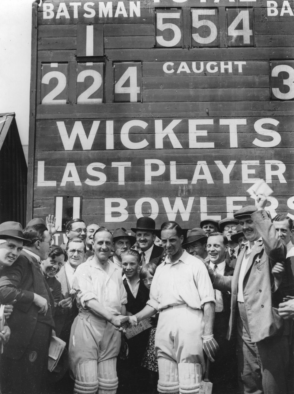 555 and all that: crowds flock in for history, in Leyton in 1932; Holmes is at left