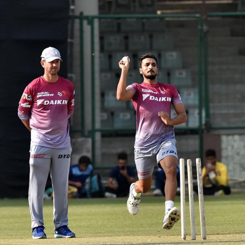 Bowling in training for Delhi Daredevils in 2019, watched by Ricky Ponting. Harshal played 12 games for Daredevils in three seasons, taking 12 wickets at an economy rate of 9.33