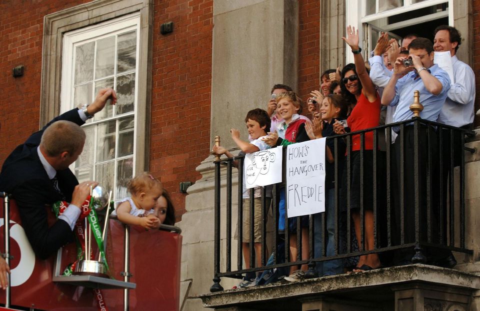 Painting the town Fred: A pickled Flintoff rides the victory bus to Trafalgar square after the 2005 Ashes victory, serenaded by adoring crowds