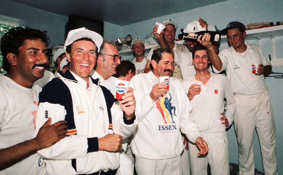 Graham Gooch celebrates Essex's 1991 County Championship win with his team-mates in the Chelmsford dressing room