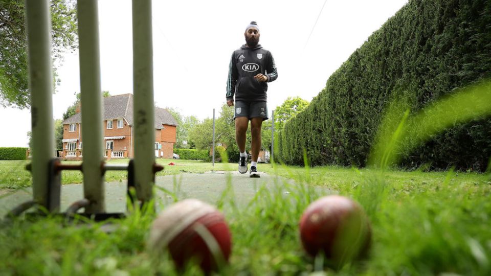 Amar Virdi, the Surrey and England Lions spinner, trains at his home